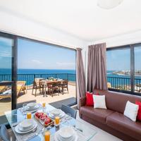 Islet Promenade Seafront Apartment with large Corner Terrace by Getawaysmalta