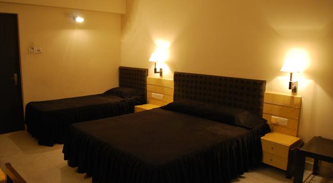 Hotel Millennium - Guwahati - Bedroom